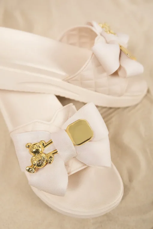 Beige Noria Quilted Slide Sandals with Bow and Gold Charm Detail<IKRUSH New