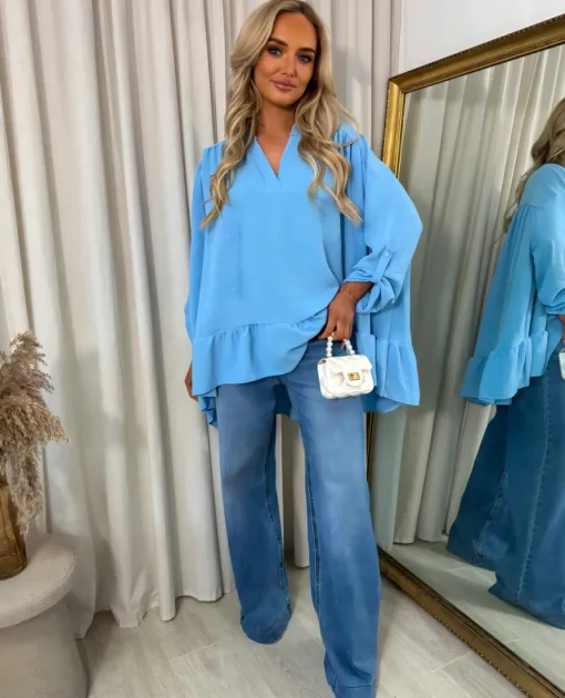 Blue Ruby V-Neck High Low Ruffle Hem Oversized Top<IKRUSH New